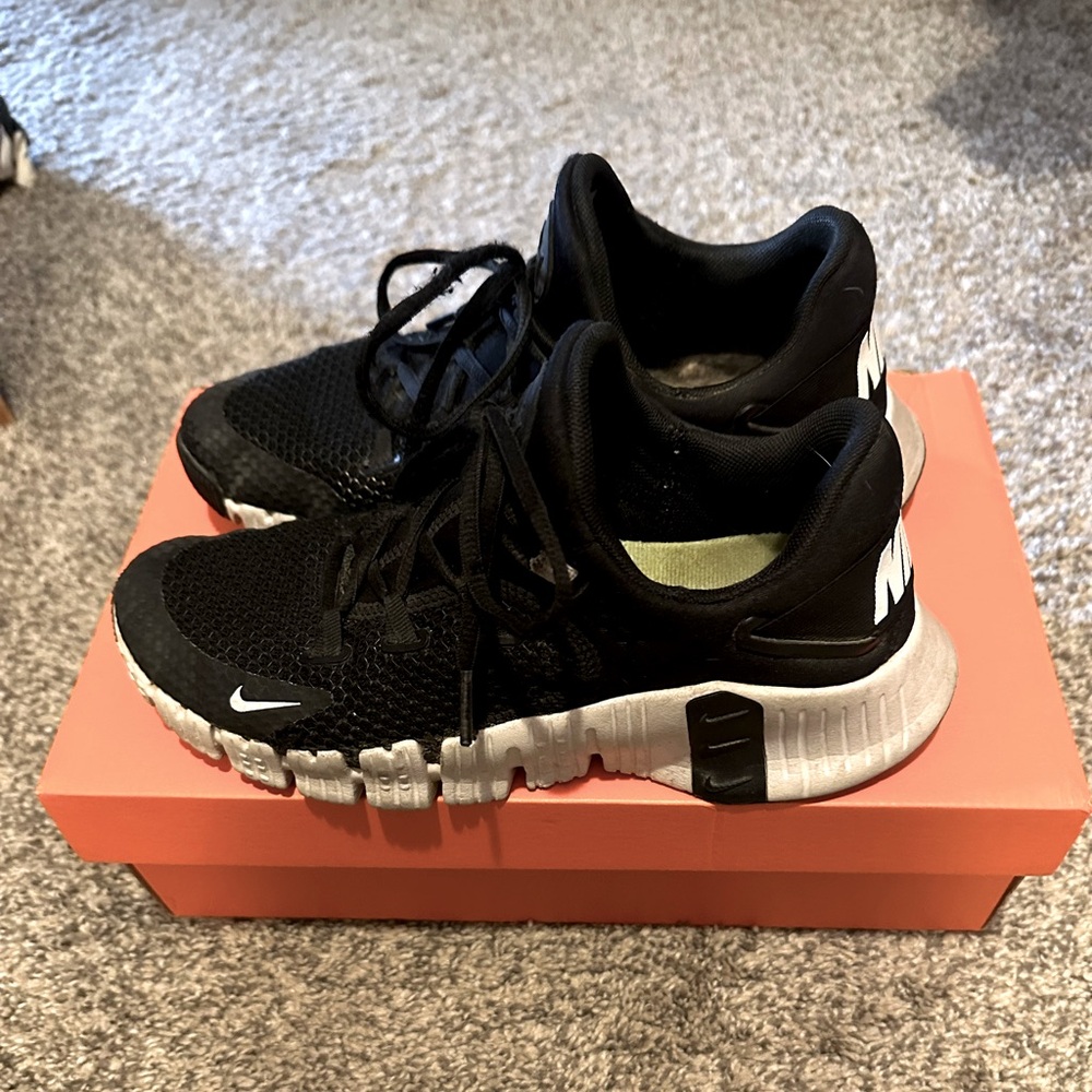 Women’s Nike Metcon sneakers.